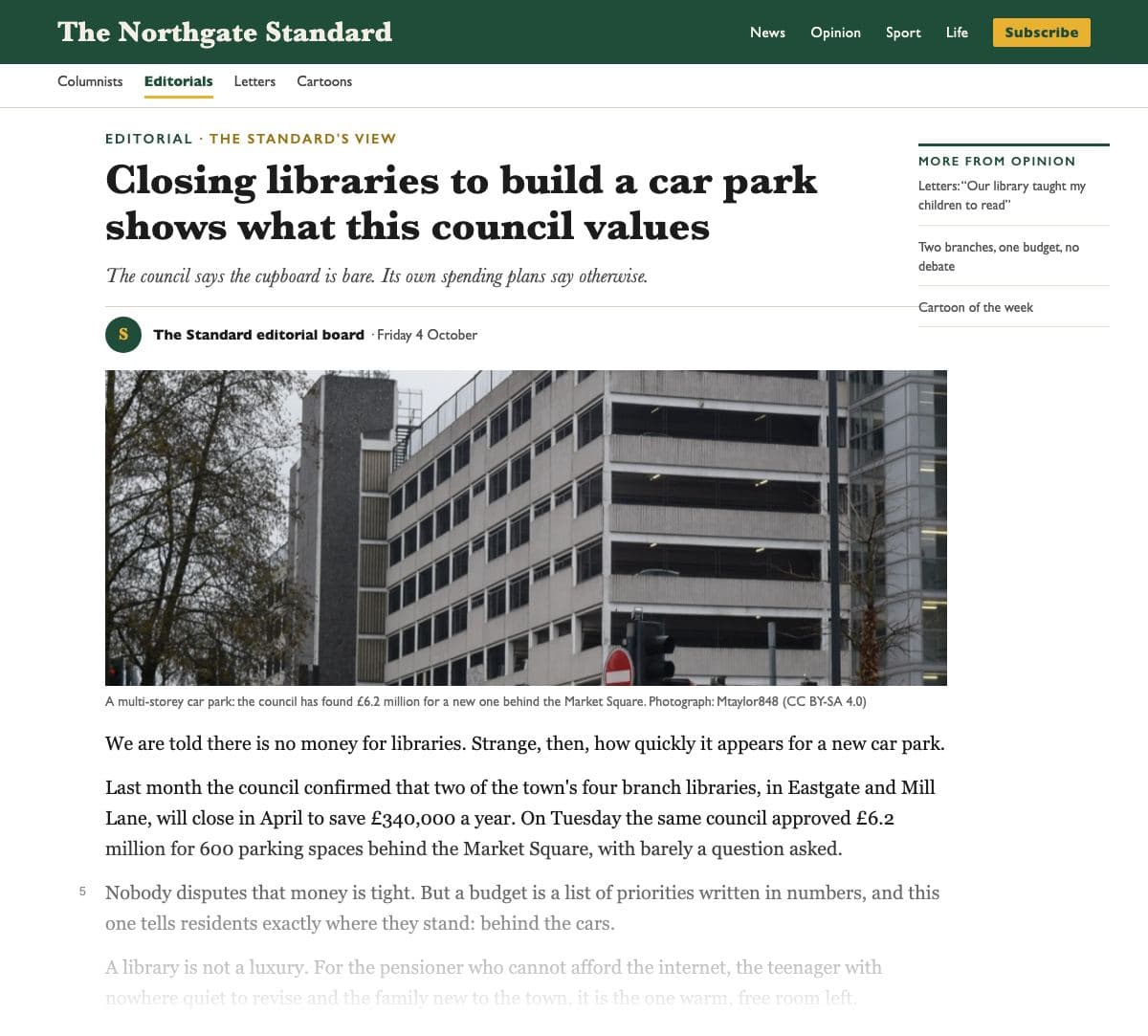 The top of an online editorial in ‘The Northgate Standard’: a green site bar; the tag ‘Editorial · The Standard's view’; the headline ‘Closing libraries to build a car park shows what this council values’; the standfirst ‘The council says the cupboard is bare. Its own spending plans say otherwise.’; an unsigned byline, ‘The Standard editorial board’; a photograph of a grey multi-storey car park captioned with the £6.2 million the council has found for a new one; then the opening lines, fading out at the foot of the clipping.