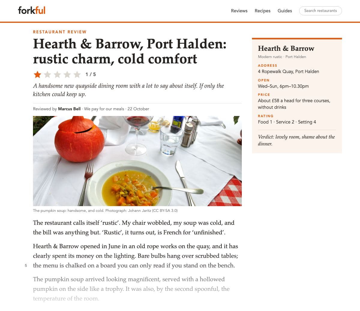 The top of an online restaurant review on ‘forkful’: the tag ‘Restaurant review’; the headline ‘Hearth & Barrow, Port Halden: rustic charm, cold comfort’; a rating of one orange star out of five; a standfirst; ‘Reviewed by Marcus Bell · We pay for our meals’; a photograph of a bowl of pumpkin soup on a white tablecloth with a whole pumpkin beside it, captioned ‘The pumpkin soup: handsome, and cold.’; a details box (address, opening hours, about £58 a head, ratings Food 1 · Service 2 · Setting 4, ‘Verdict: lovely room, shame about the dinner.’); the opening lines fade out at the foot of the clipping.